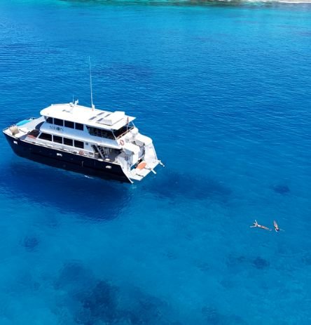 Boat in crystal clear sea
